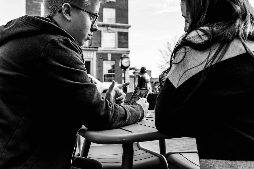 two workers talking outside